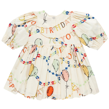 back of cream 3/4 length sleeve dress with birthday buddies design including garlands and balloons