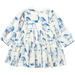 back of cream long sleeved dress with blue horse print