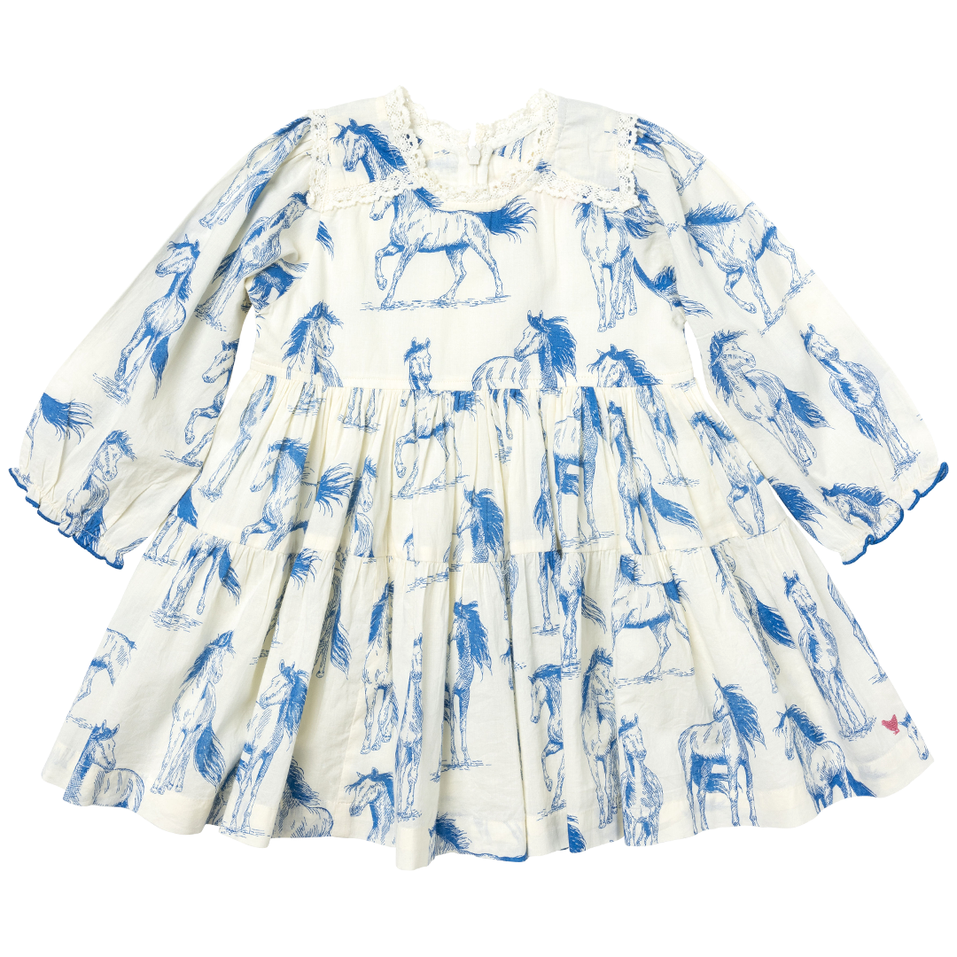 cream long sleeved dress with blue horse print