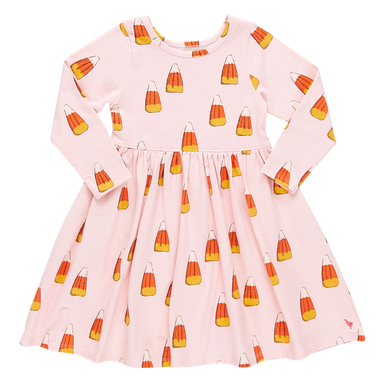 pink long sleeved dress with orange, yellow and white candy corn print