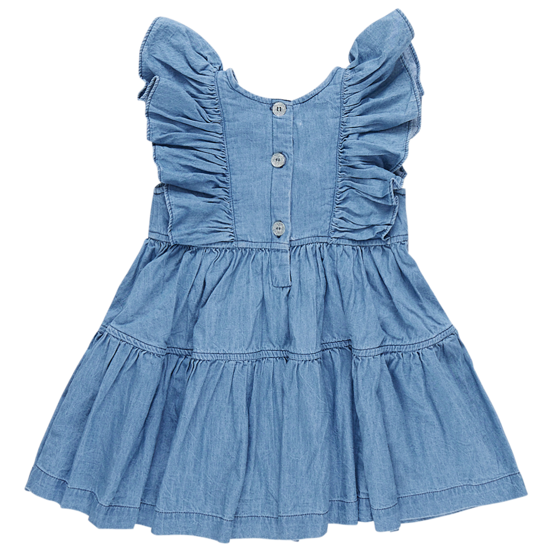 back of chambray sleeveless dress with ruffle detail and 3 button closure 