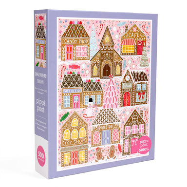 Pippi Post 500 piece Christmas jigsaw puzzle box featuring a colorful gingerbread village with candy shop cafe toy shop bookstore and post office