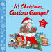 Book cover of 'It's Christmas, Curious George!' with a monkey and dog with Christmas presents and decorations.
