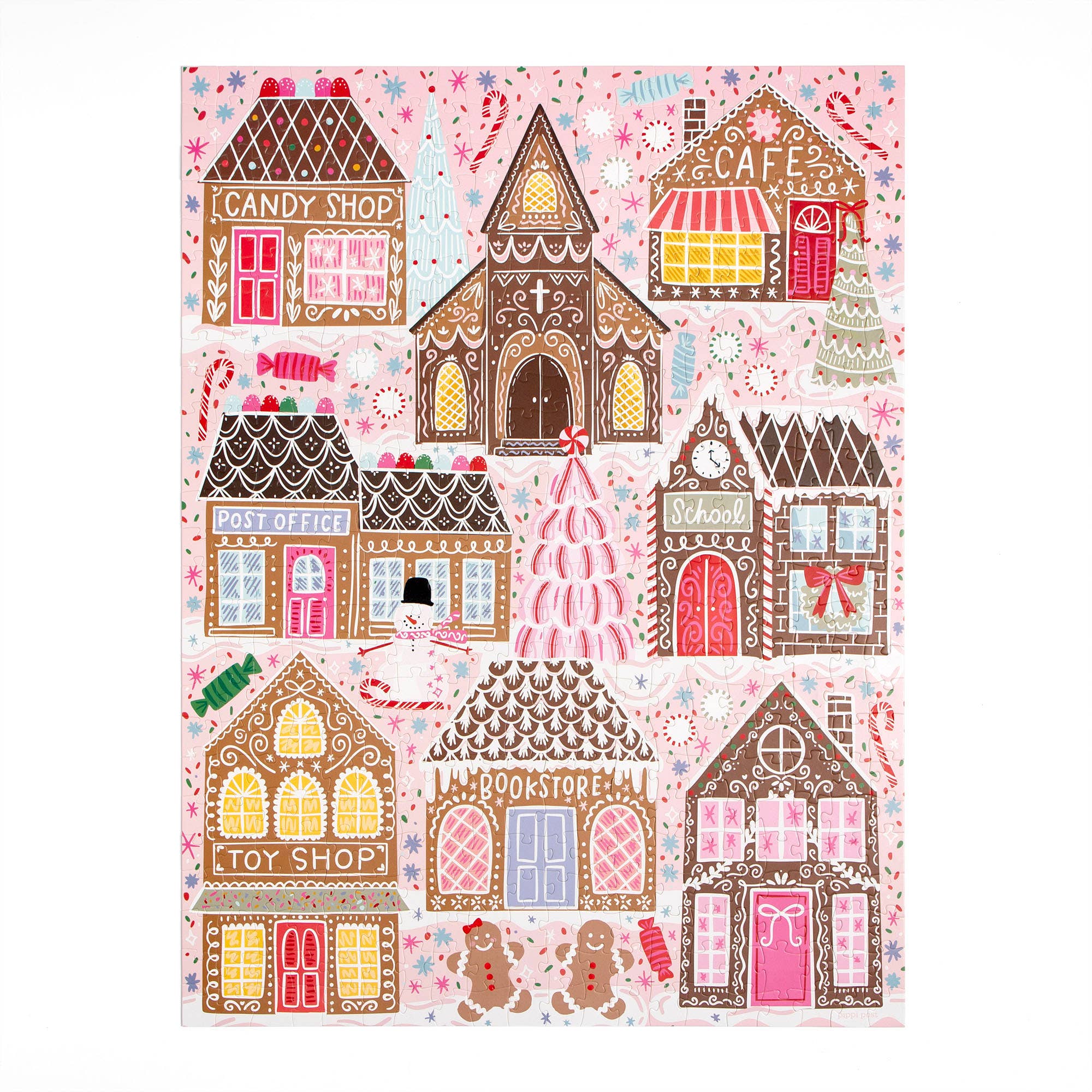 Pippi Post Gingerbread Square Christmas jigsaw puzzle showing a festive gingerbread village with candy shop cafe post office toy shop bookstore and school buildings