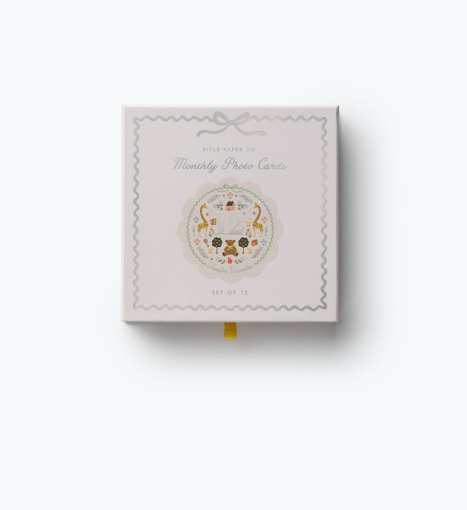 Rifle Paper Co monthly photo cards shown in a white box with a delicate gray border colorful floral illustration and set of 12 cards