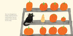 Illustration of a cat looking at pumpkins on a shelf with a pear, from a children's book.