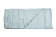 Folded light blue blanket on a white background