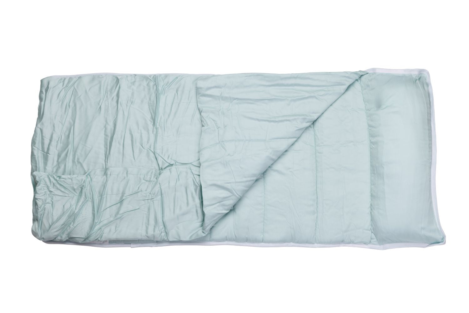Folded light blue blanket on a white background