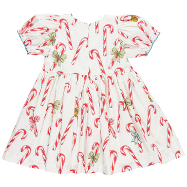 back of white puff sleeve dress with red candy cane print and 3 blue bows down the center