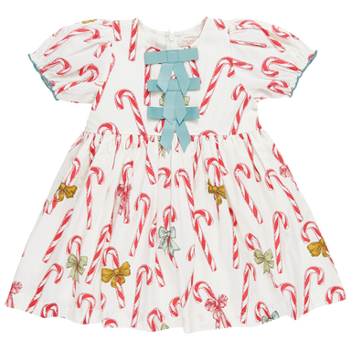 white puff sleeve dress with red candy cane print and 3 blue bows down the center
