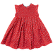 back of red sleeveless dress with smocking at the chest and tiny white rose print