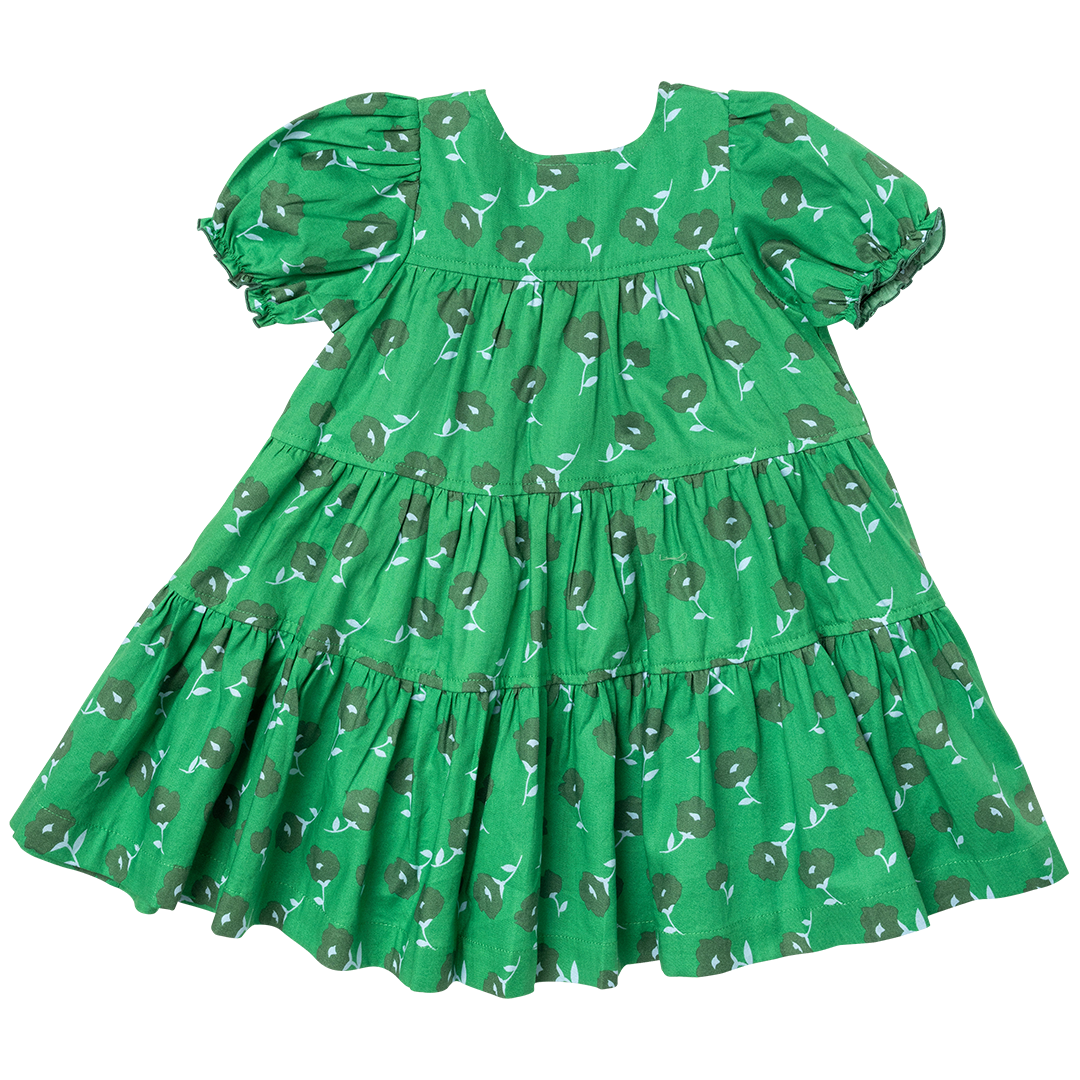 back of green button down dress with puff sleeve and flower print
