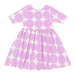 back of short sleeve white dress with large purple dot design all over