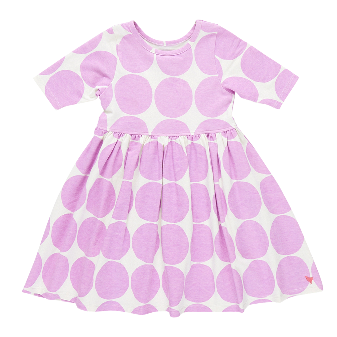 short sleeve white dress with large purple dot design all over