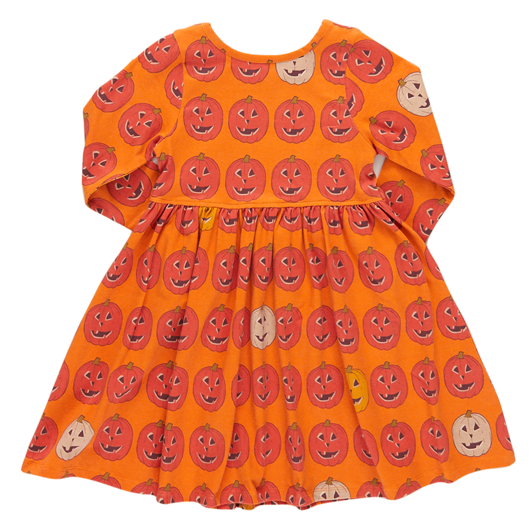 back view of long sleeve orange dress with orange jackolatern print