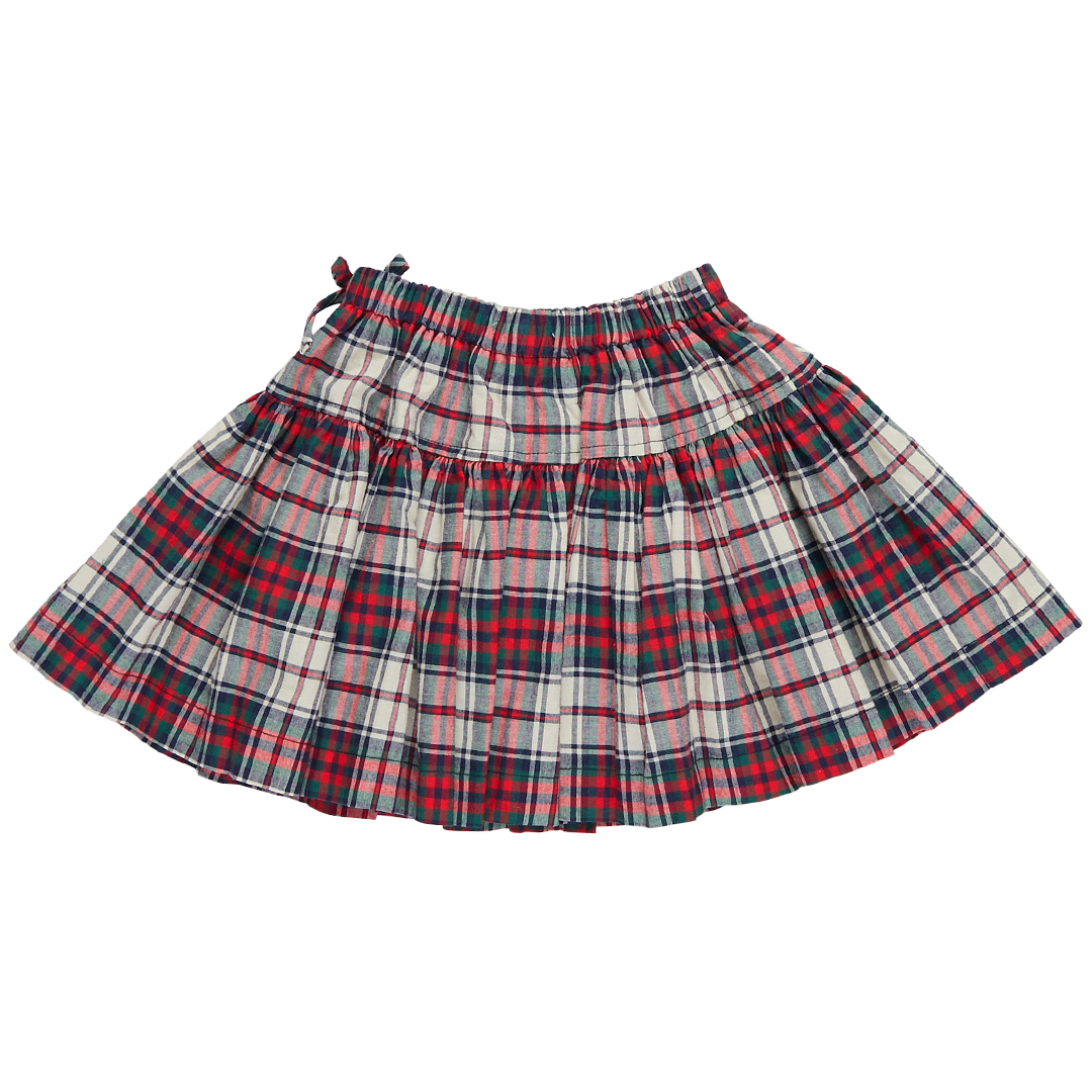 back of red, green, navy and cream colored tartan plaid skirt with bow detail